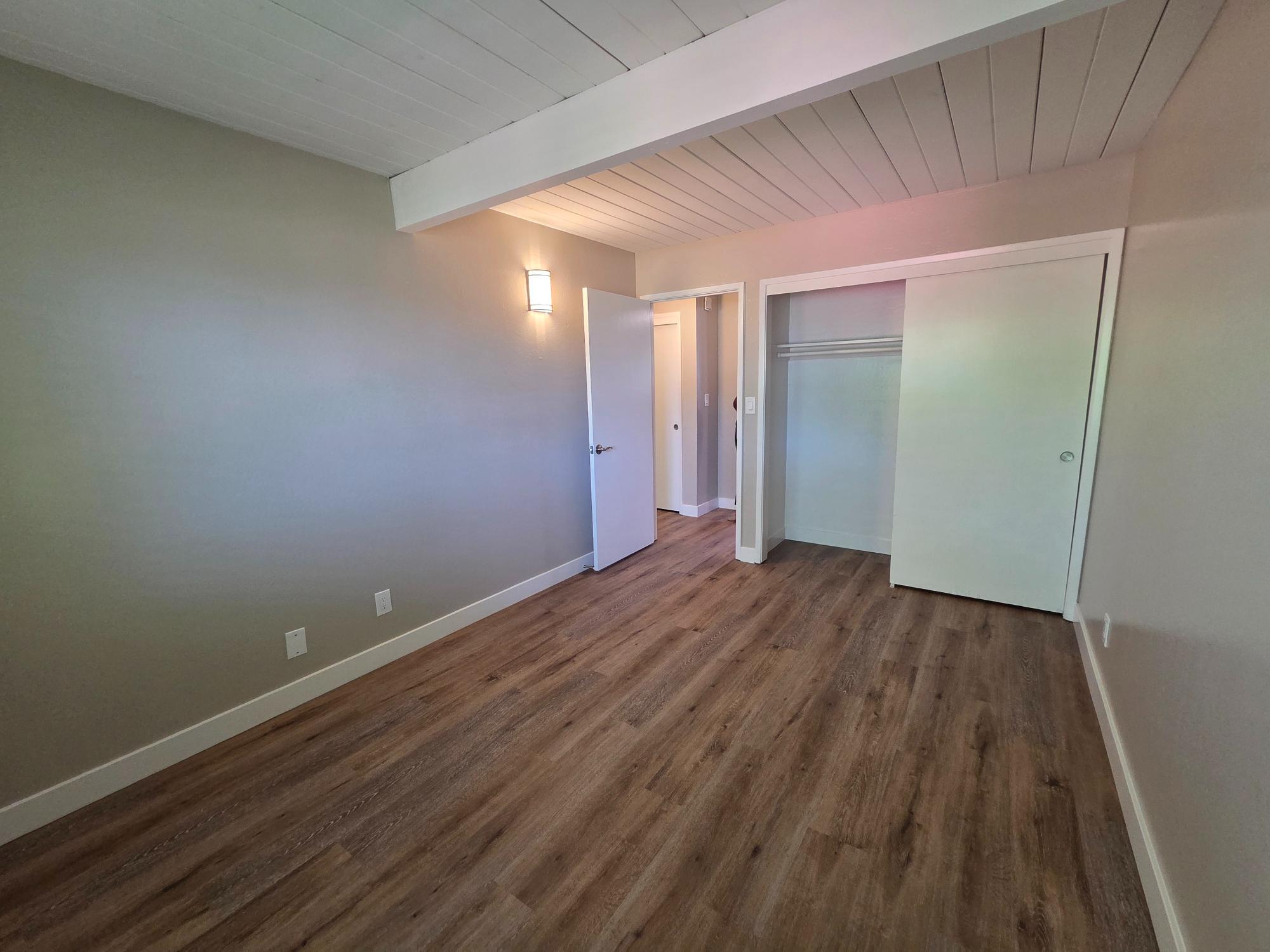 Unfurnished bedroom with closet