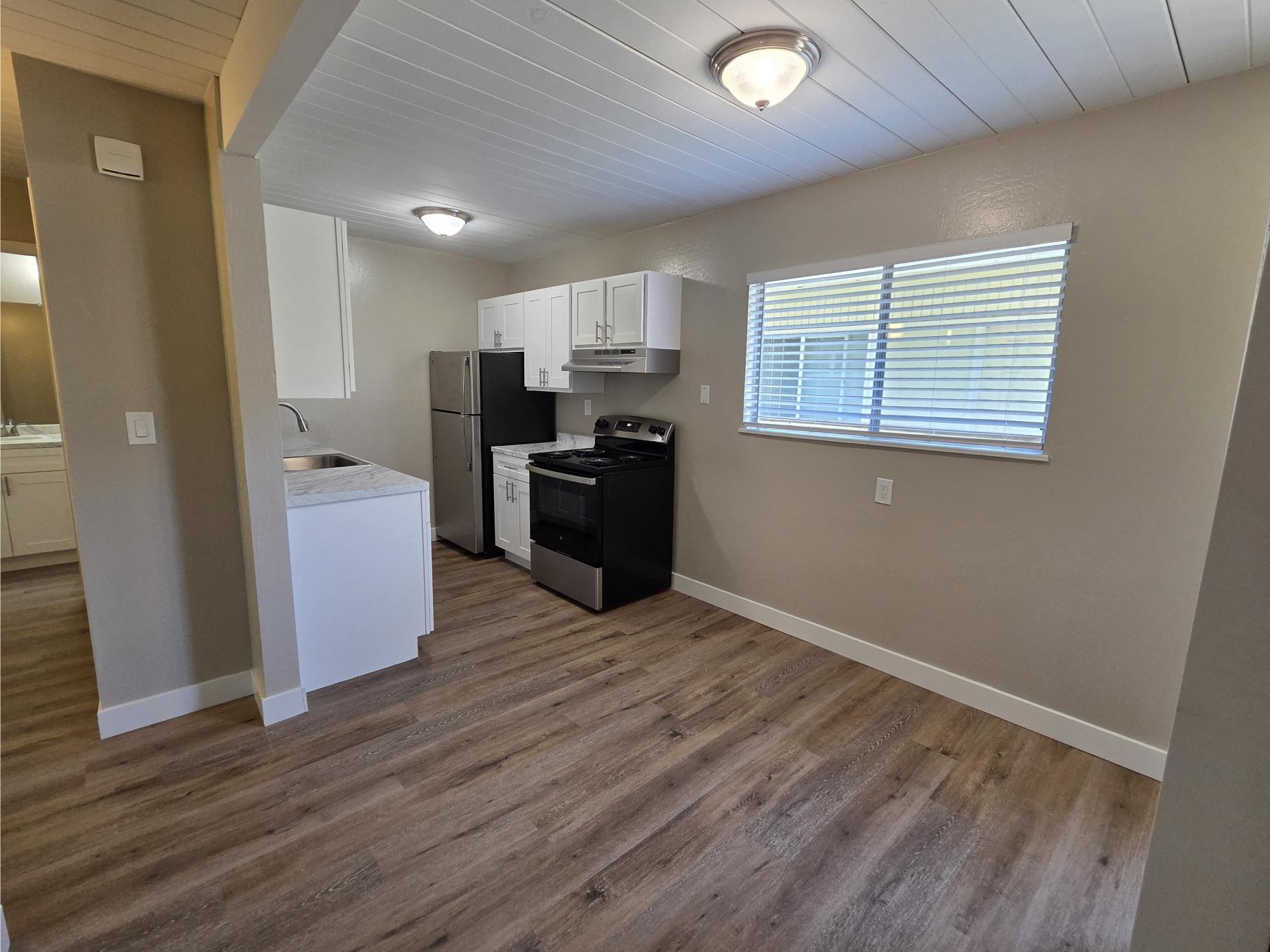 bathroom with white vanity and mirror