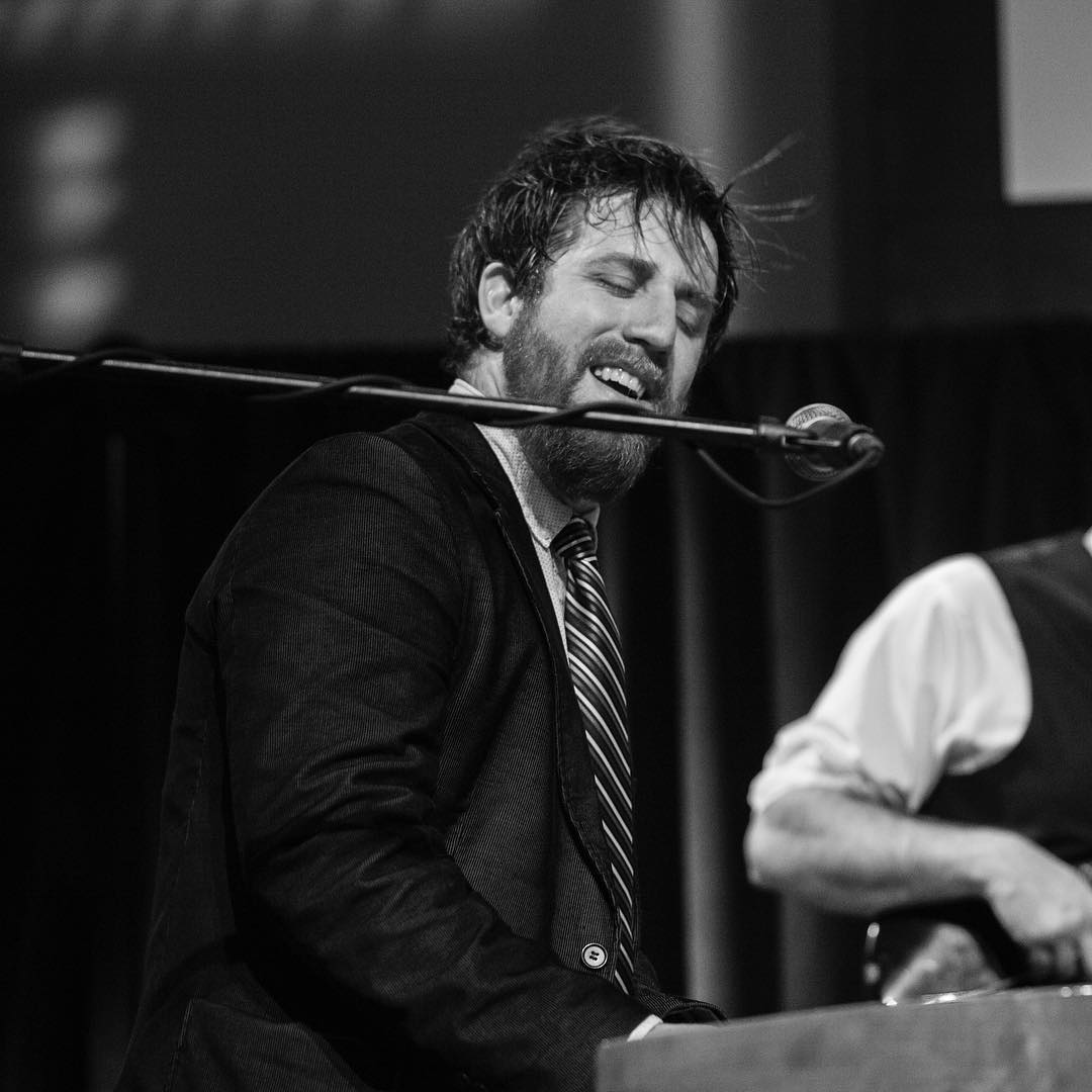 Caleb Stark performing live with a rock band at the Sandler Center for the Arts in Virginia Beach, VA.