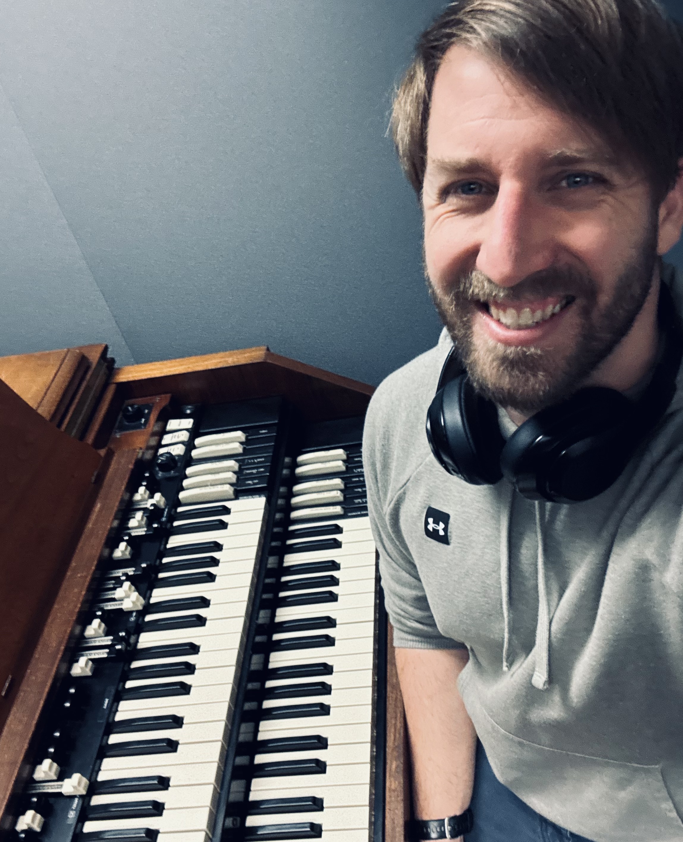 Caleb Stark pictured with a Hammond B3 organ.