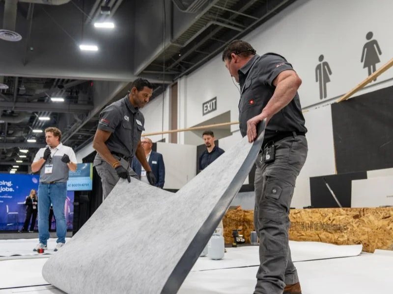 A building clinic demonstration on the International Roofing Expo show floor.