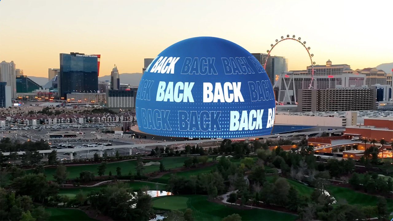 The Las Vegas Sphere and the Las Vegas Strip at dusk, from the International Builders' Show site.