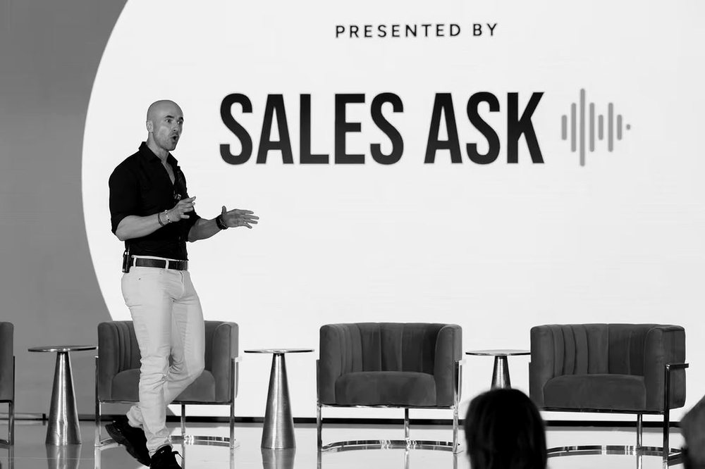SalesAsk presenting on stage at Builder 100