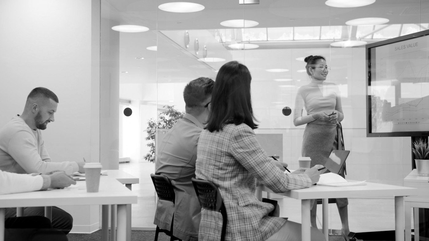 A sales trainer running a session with a home service team