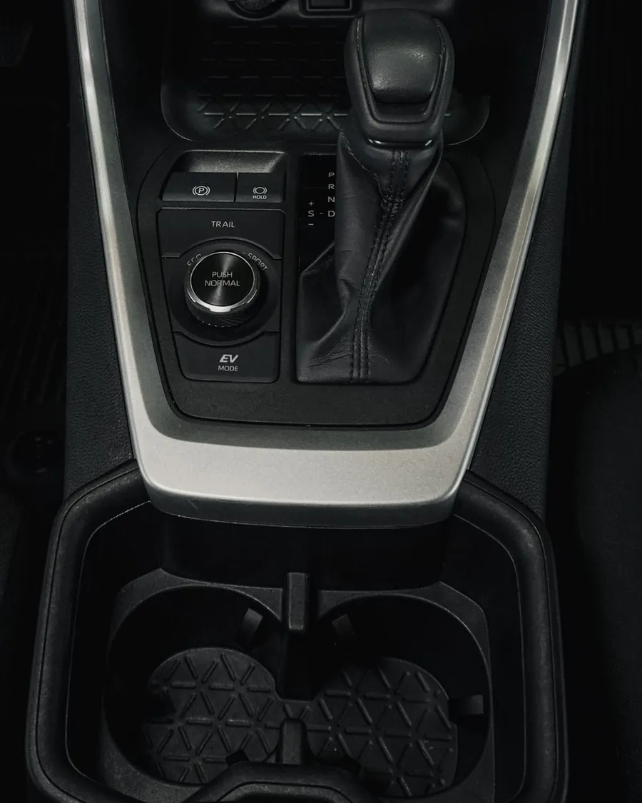 Car cupholder console after interior detailing by High Shine Detailing — spotless and debris-free