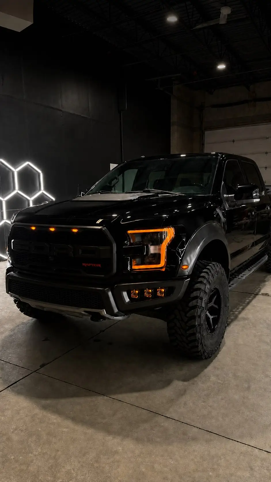 Ceramic coated black Ford Raptor at the High Shine Detailing shop in Shakopee