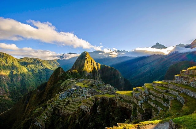 a view of a mountain range with a valley in the foreground