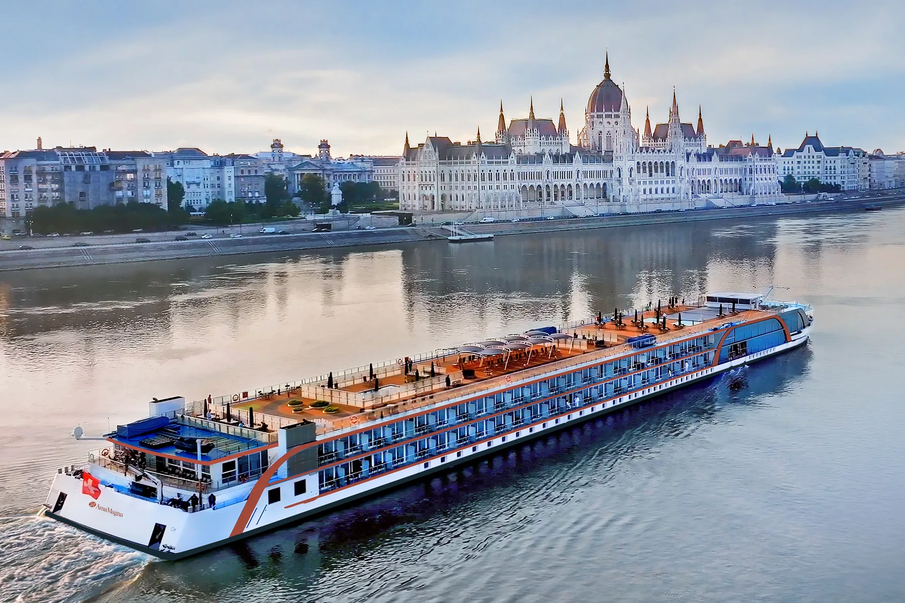 The AmaWaterways river ship AmaMagna on the Danube passing the Hungarian Parliament in Budapest