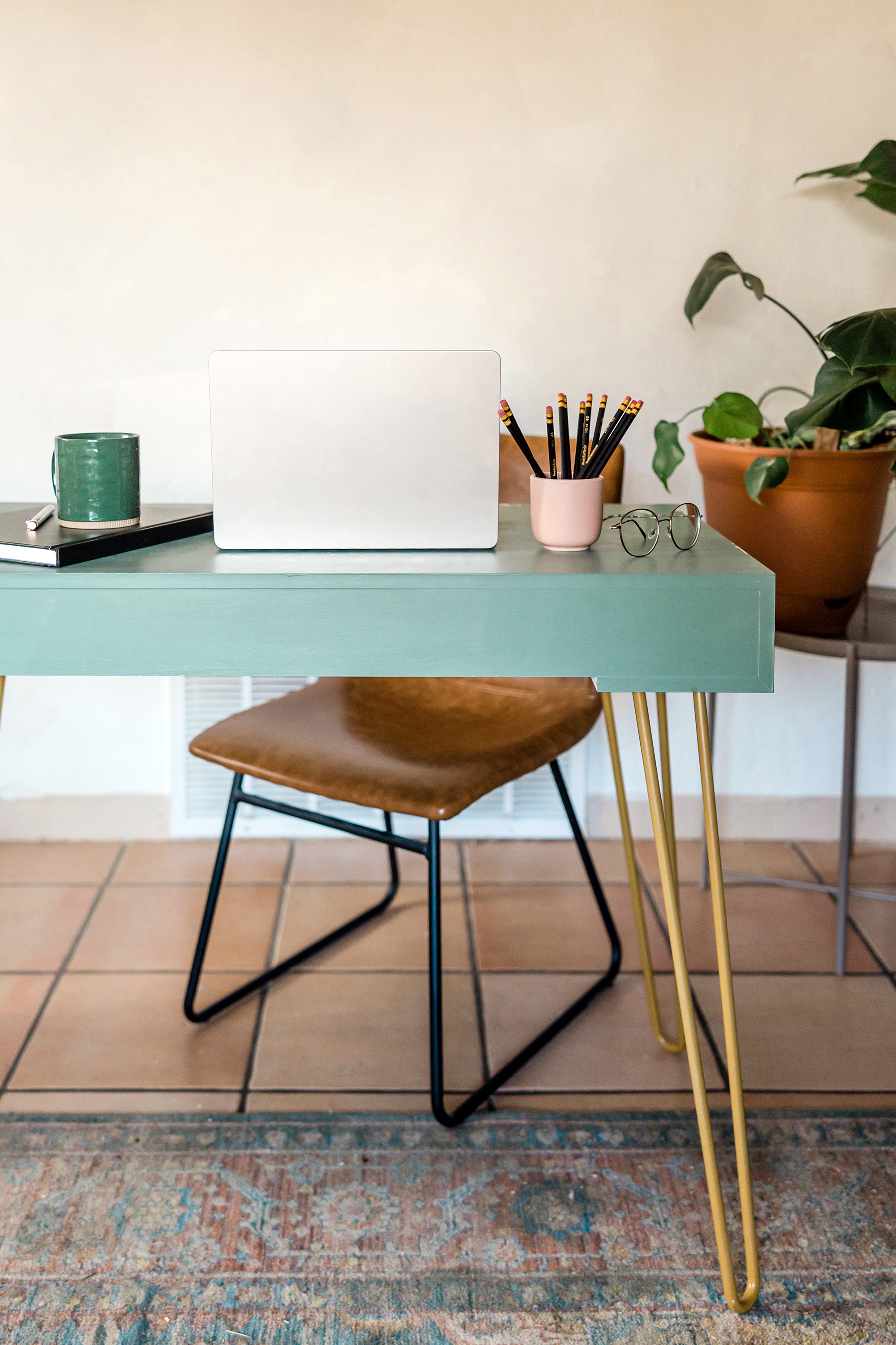 Green desk and chair workspace