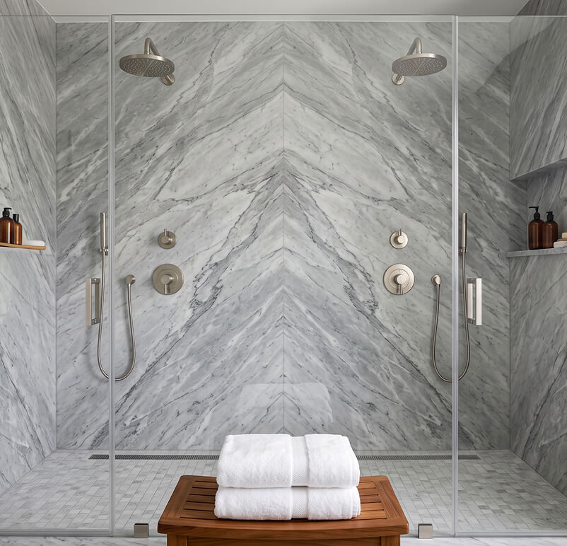 Modern bathroom with bathtub, large window, sink with mirror, and shelves with towels.