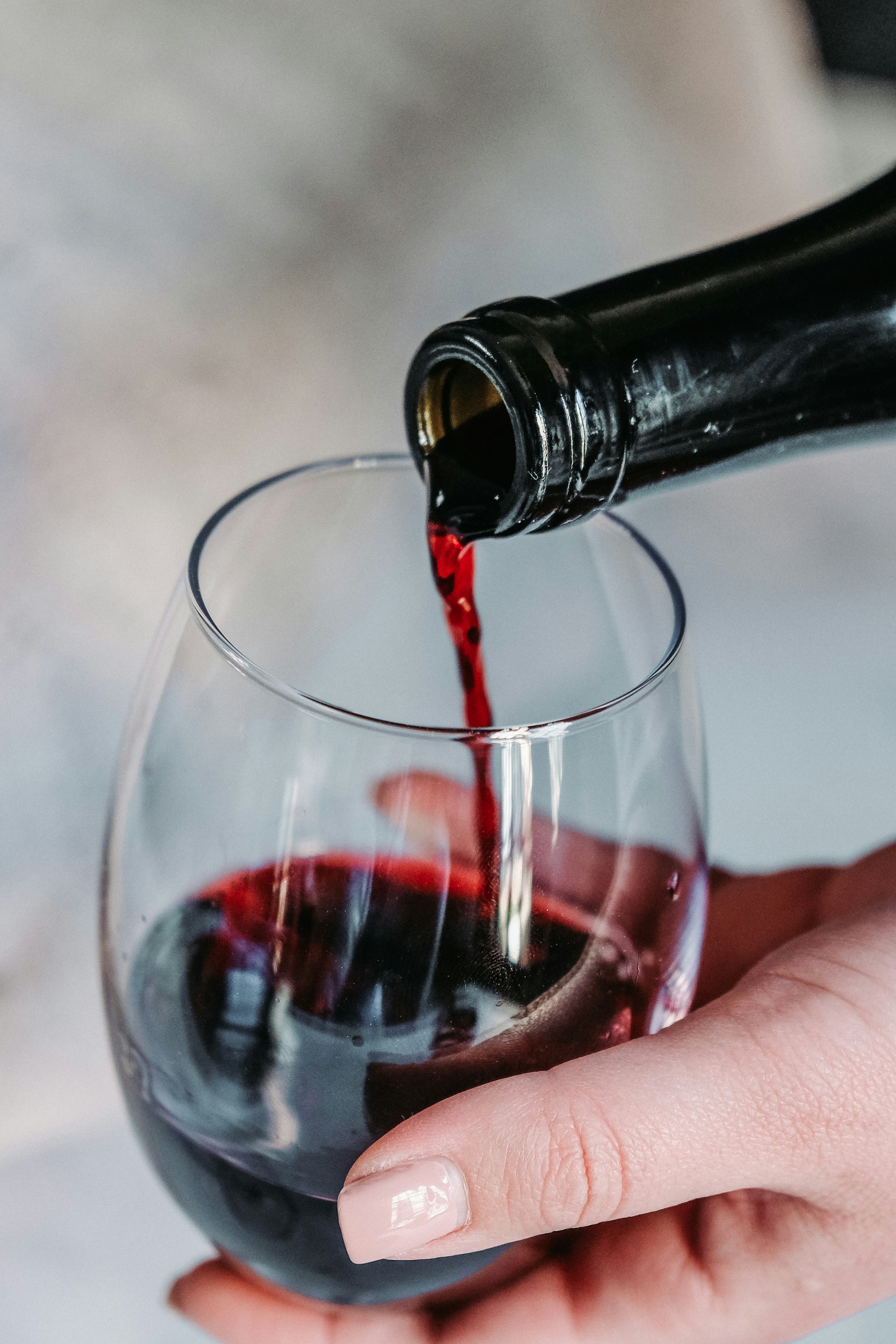 Pouring wine stock image