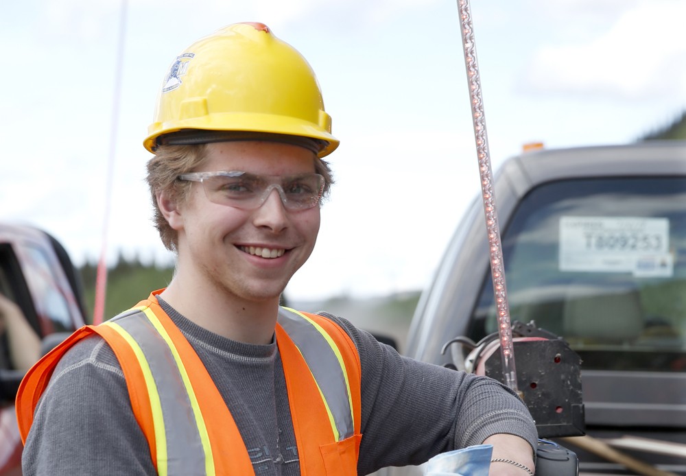Mining heavy-duty maintenance mechanic working on a piece of equipment