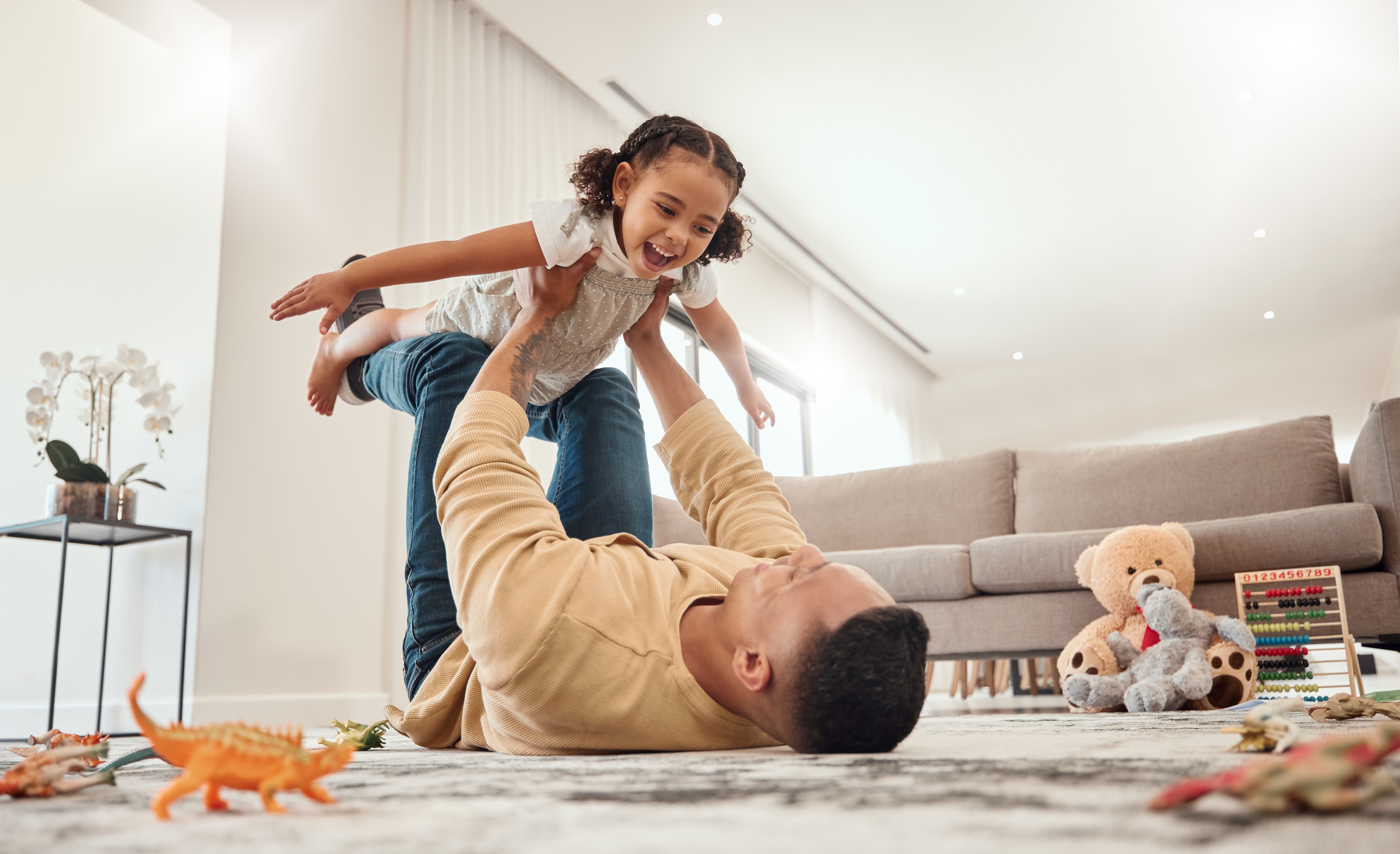 Dad and daughter playing stock photo