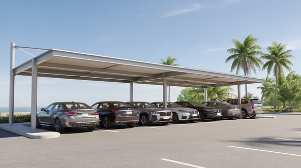 A large cantilever shade structure provides maximum sun protection for a row of parked cars in a sunny parking lot, surrounded by palm trees. This durable shade solution not only shields vehicles from harmful UV rays but also enhances the visual appeal of outdoor spaces.