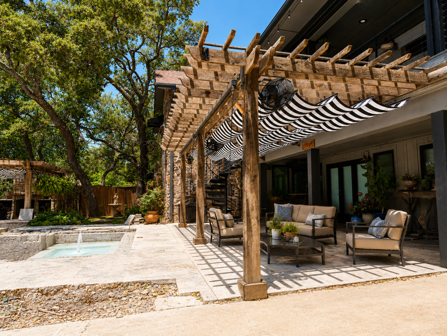 Golf View residence pergolas with retractable Roman shades