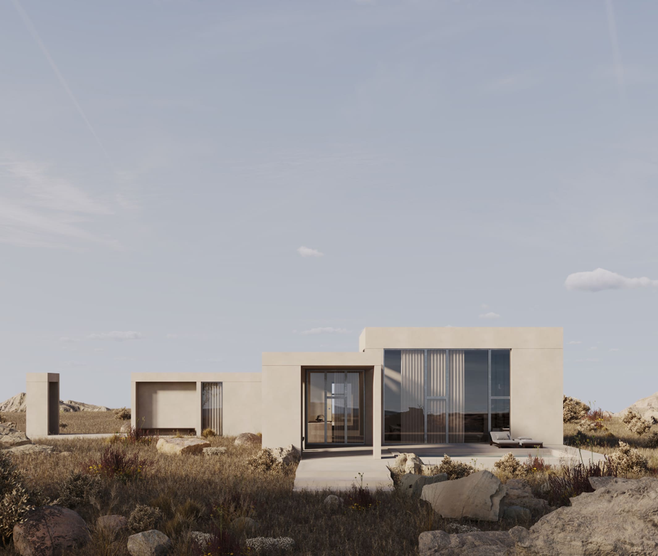 Modern minimalist house with large glass windows in a rocky, dry grassland under a partly cloudy sky.