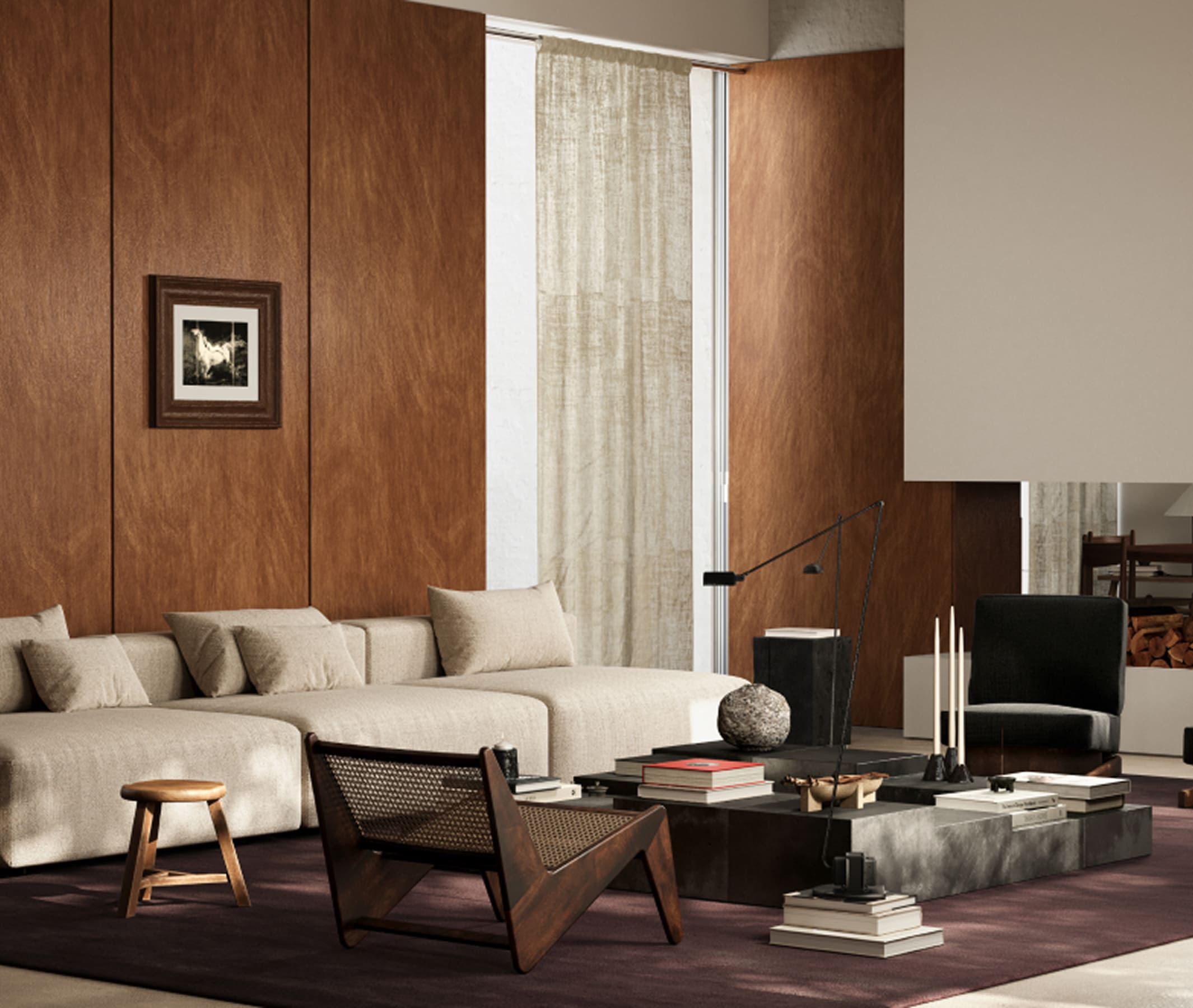 Modern living room with beige sofa, wooden chair, low coffee table with books, and dark rug.