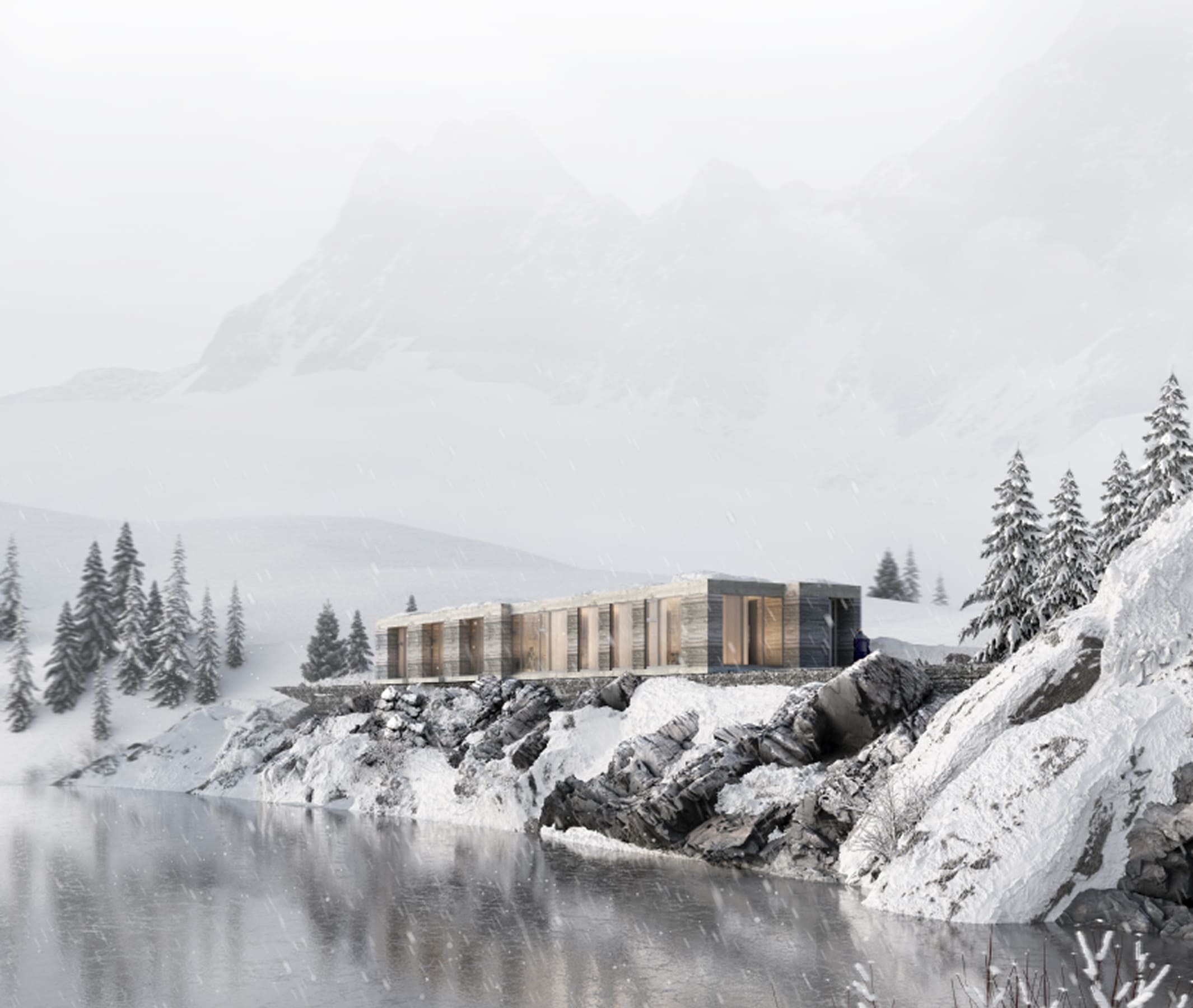 Modern cabin on rocky shore surrounded by snow, pine trees, and foggy mountains in winter.