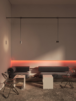 Minimalist modern lounge area with two black cylindrical sofas, two small beige square side tables, and two black metal folding chairs on a concrete floor, illuminated by a horizontal red light strip and three pendant lights hanging from the ceiling.