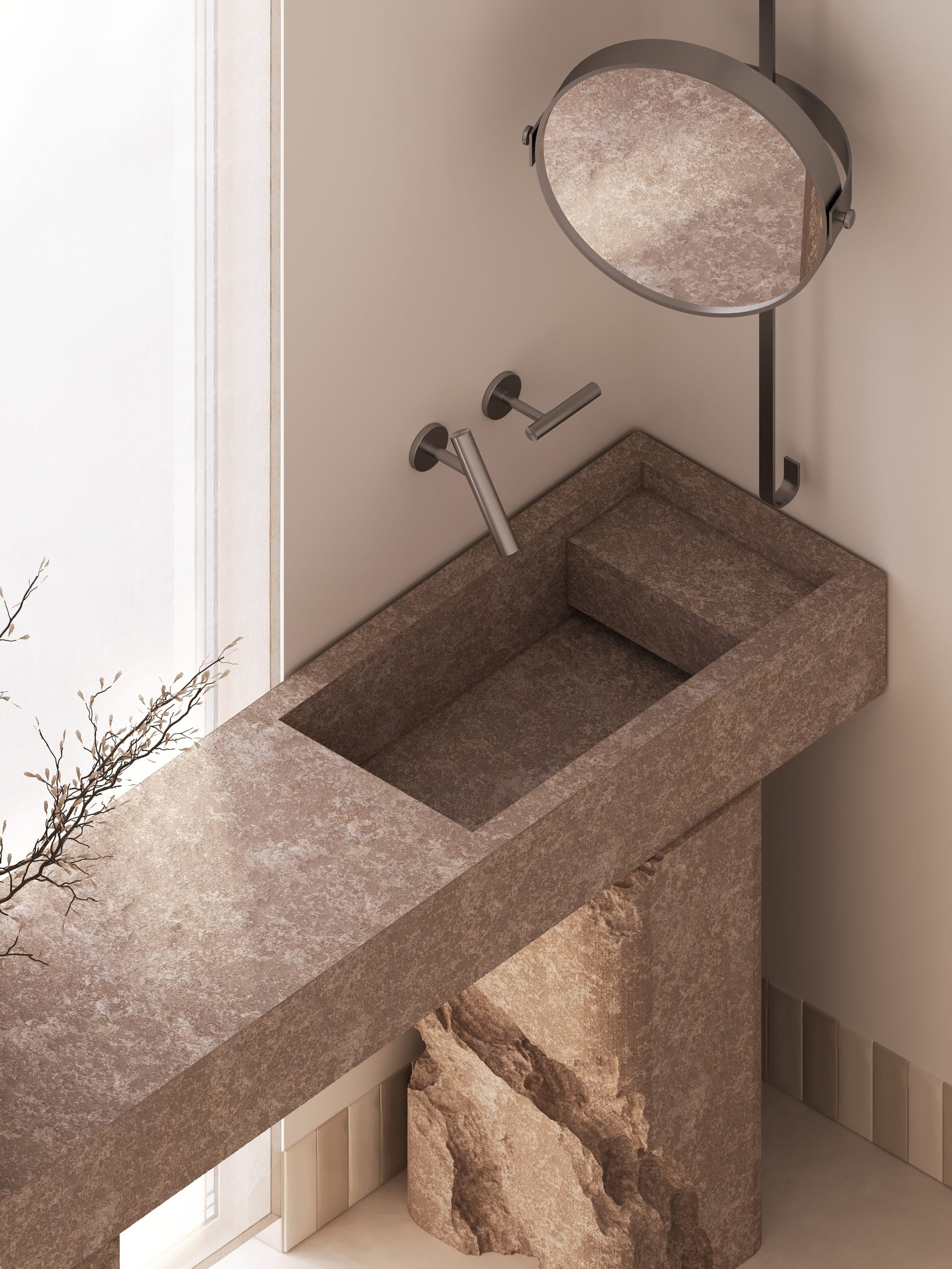Minimalist bathroom sink made from textured stone with a rectangular basin and a stepped shelf on the right, mounted on a cylindrical stone pedestal, featuring a wall-mounted metallic faucet and handle, next to a round mirror with a thin frame attached to the wall, with soft natural light coming from a nearby window.