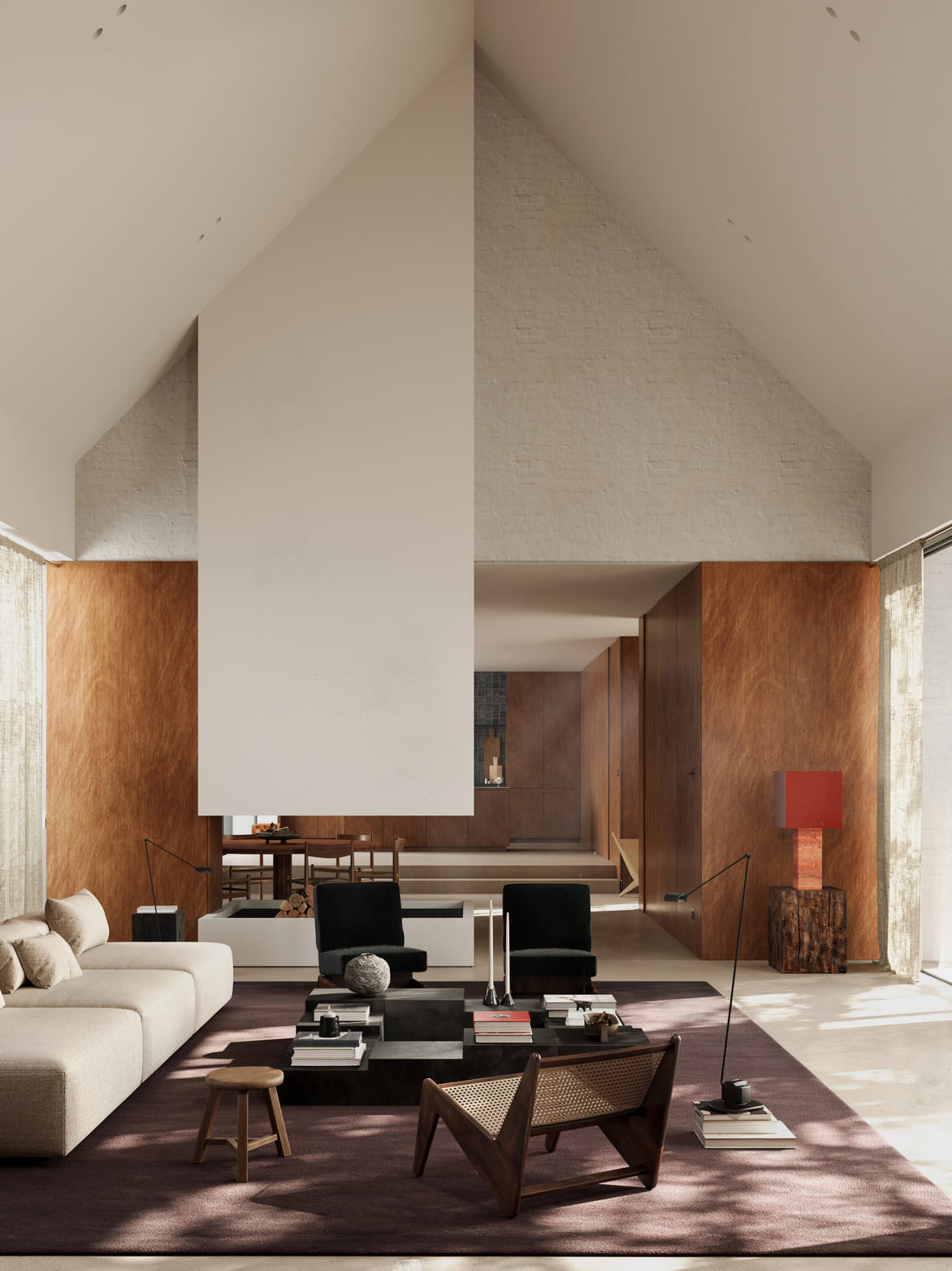 Modern living room with high vaulted ceilings and wood-paneled walls featuring a beige sectional sofa, two black chairs, a wooden lounge chair, and a large dark rug. A suspended minimalist white fireplace hangs in the center, with a low black coffee table holding books and decorative items. A wooden stool and floor lamps flank the seating area. Sunlight filters through sheer curtains on floor-to-ceiling windows, brightening the neutral-toned room.