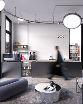 Modern minimalist coffee shop interior with concrete floor, dark furniture including a curved sofa and round table, black counter with coffee machines, and large windows letting in natural light; a blurred figure walks past the counter under a white circular ceiling light.