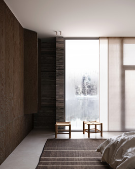 Minimalist bedroom interior with large vertical window, two wooden chairs, dark wood walls, and a bed with white linens partially visible on the right.