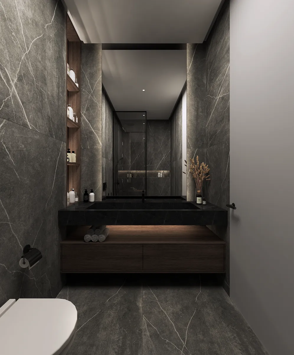 Modern bathroom with dark marble walls, a black sink, wooden shelves, and a large mirror.