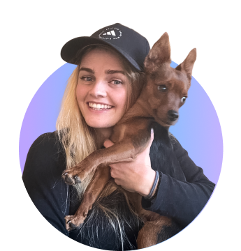 Woman holding a little dog