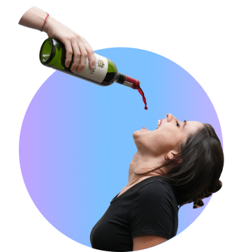 Erin Cloete creative picture receiving red wine from a bottle