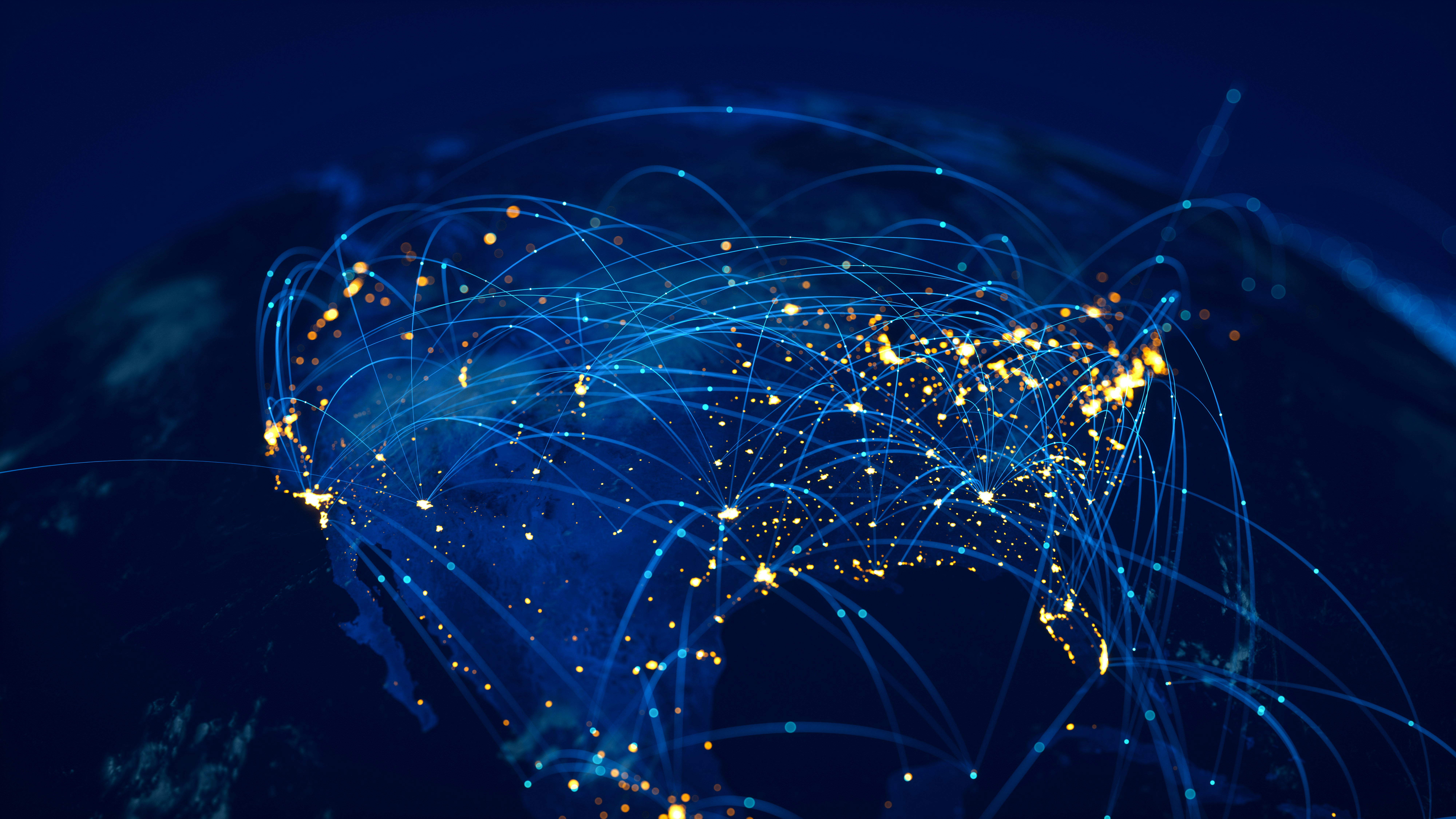 Network connections over a globe showing illuminated cities linked by blue arcs of data flow.