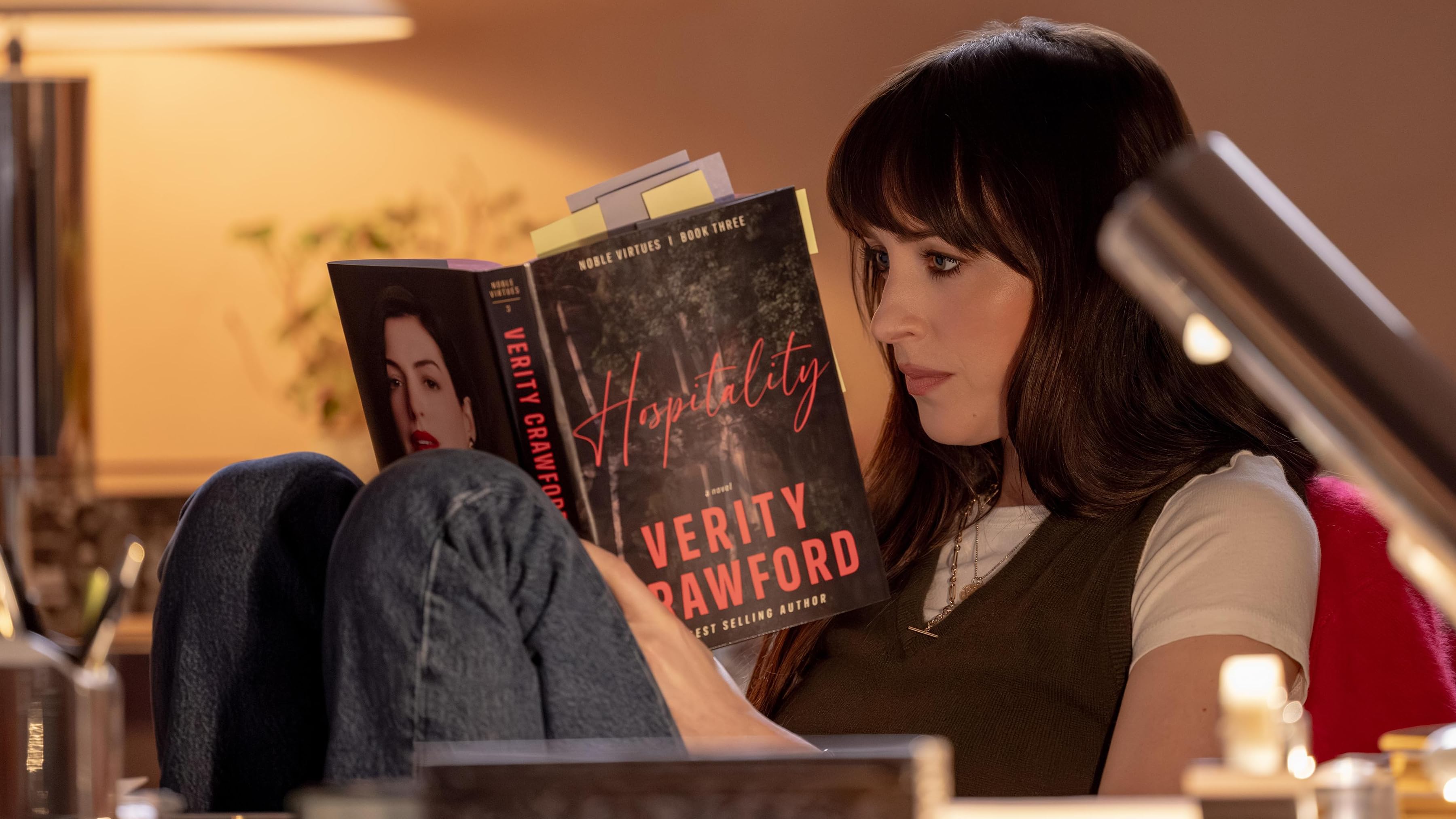 A still from the 2026 film "Verity," showing Dakota Johnson playing the role of Lowen Ashleigh.