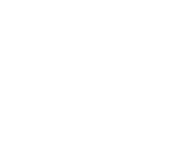 Black gear icon with several small black dots around it on a white background.