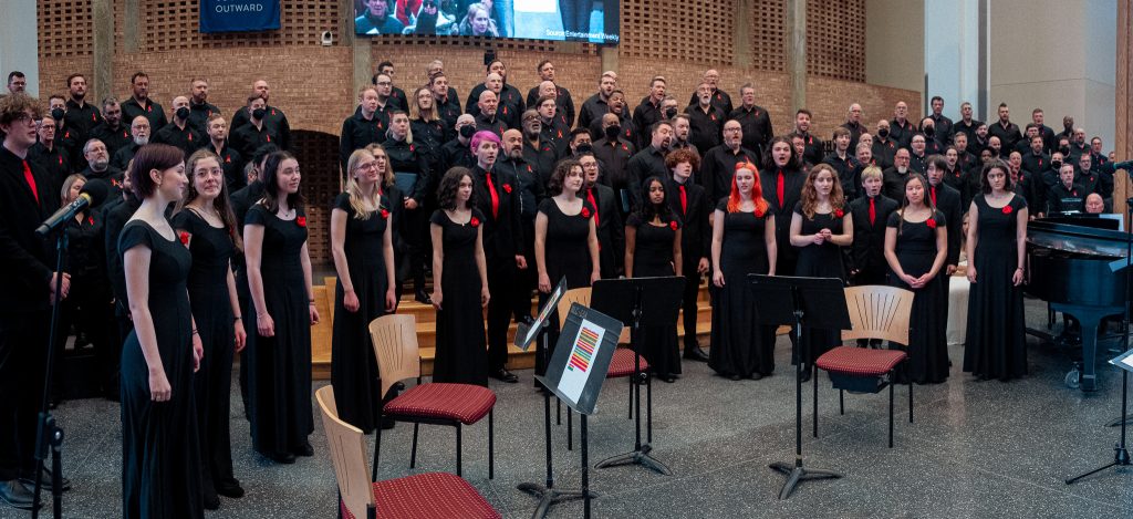 The Twin Cities Gay Men's Chorus sings with students from Minneapolis Central High School.