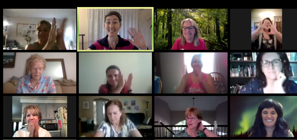A group of people hold a meeting over zoom