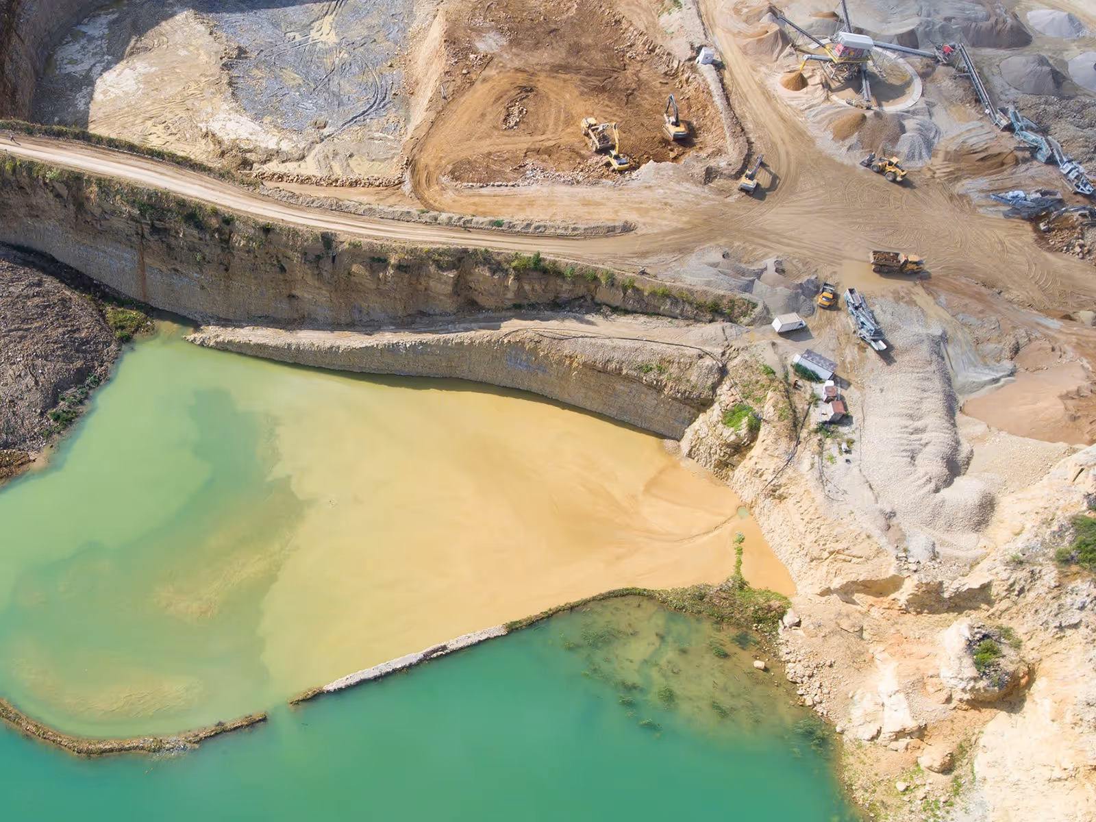 Mining quarry with special equipment, open pit excavation. Sand mine. View from above.