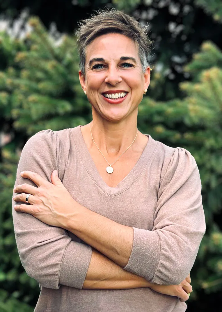 Dr Terri Fites outdoors smiling at camera