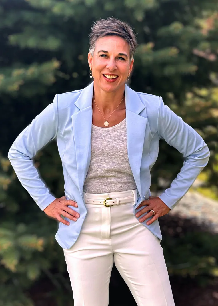 Dr Terri Fites standing outdoors smiling at camera