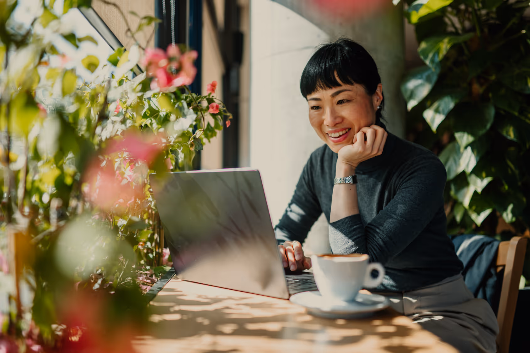 Woman looking at computer stock image