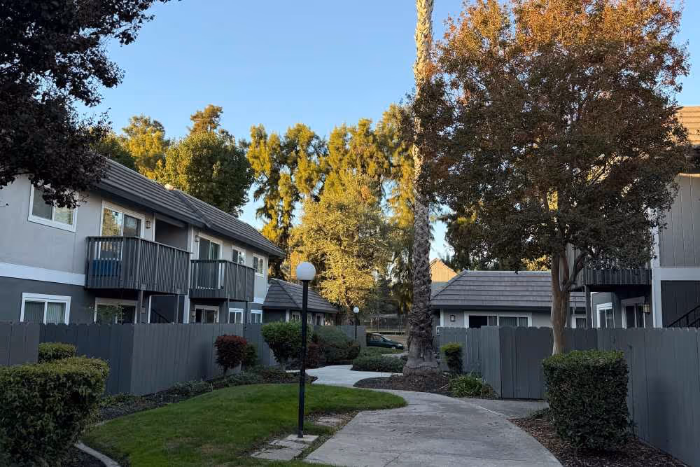 Exterior featuring walking path and lamp post