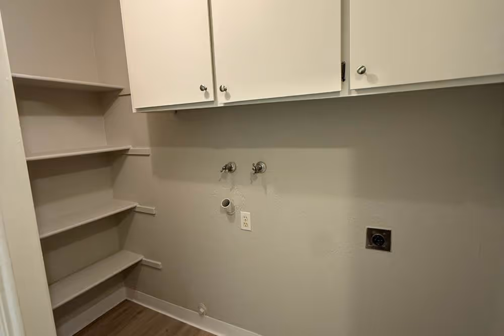 Laundry room with washer and dryer connections 