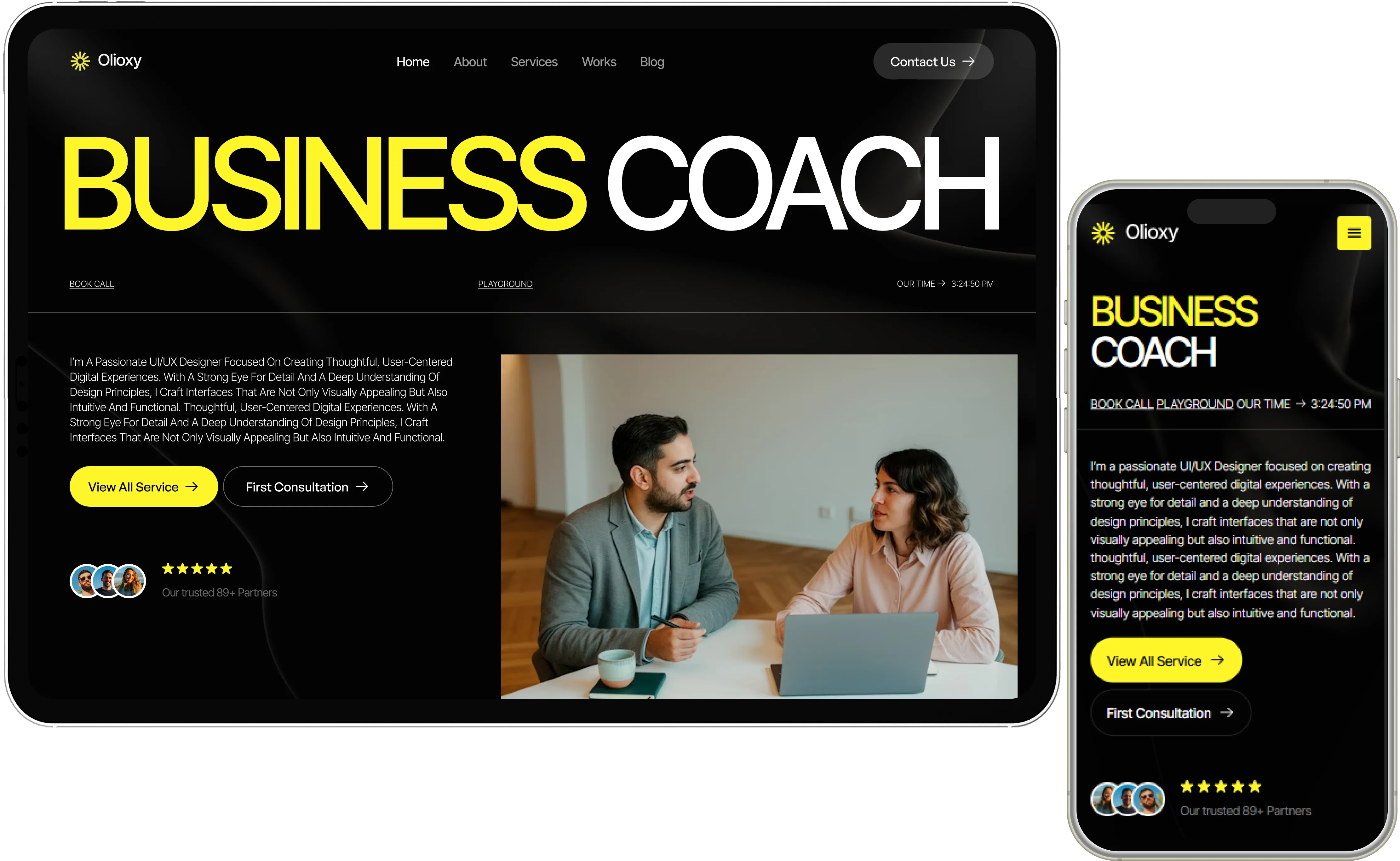 Tablet and smartphone screens showing a business coach website with a header, navigation menu, call to action buttons, a photo of a man and woman discussing at a desk, and partner ratings.