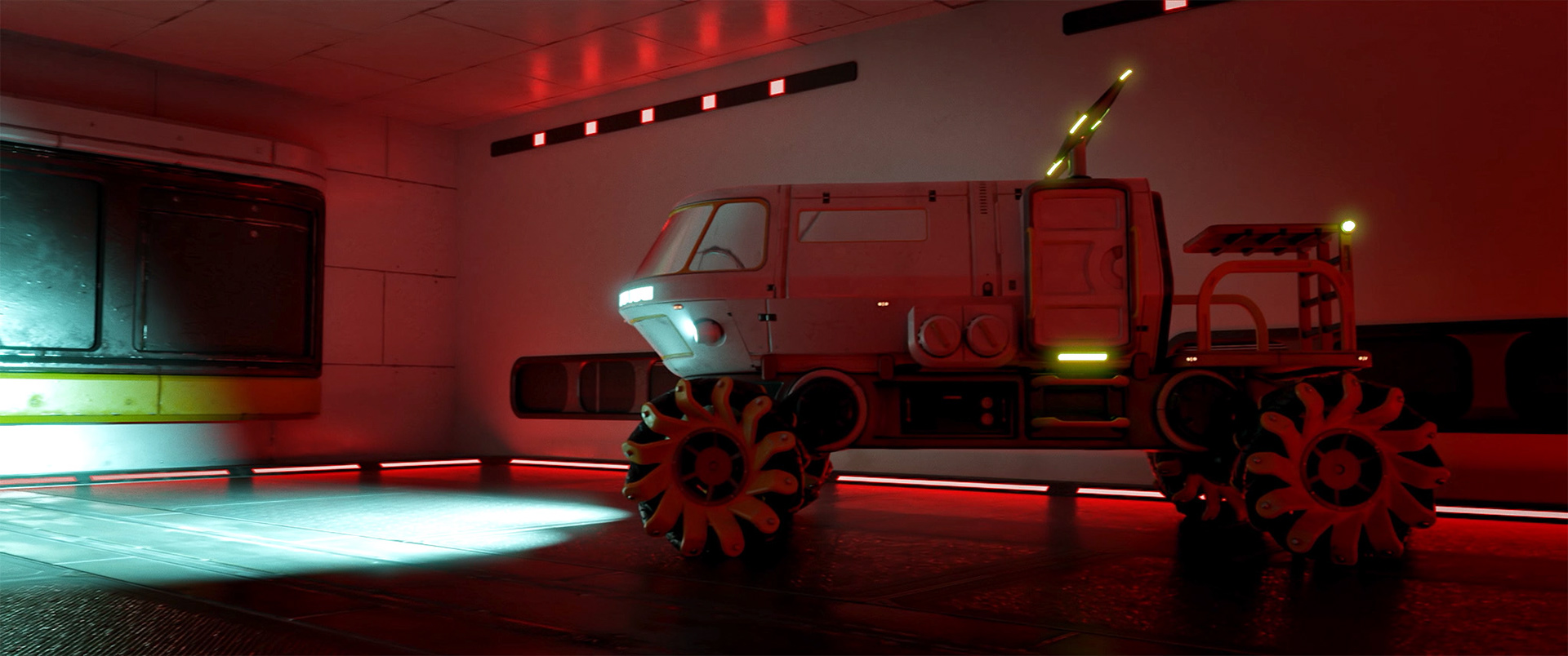 Futuristic rover with large wheels illuminated by soft red and blue lighting inside a room.