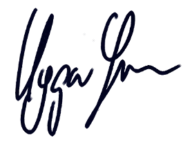Dark blue handwritten signature on a white background.