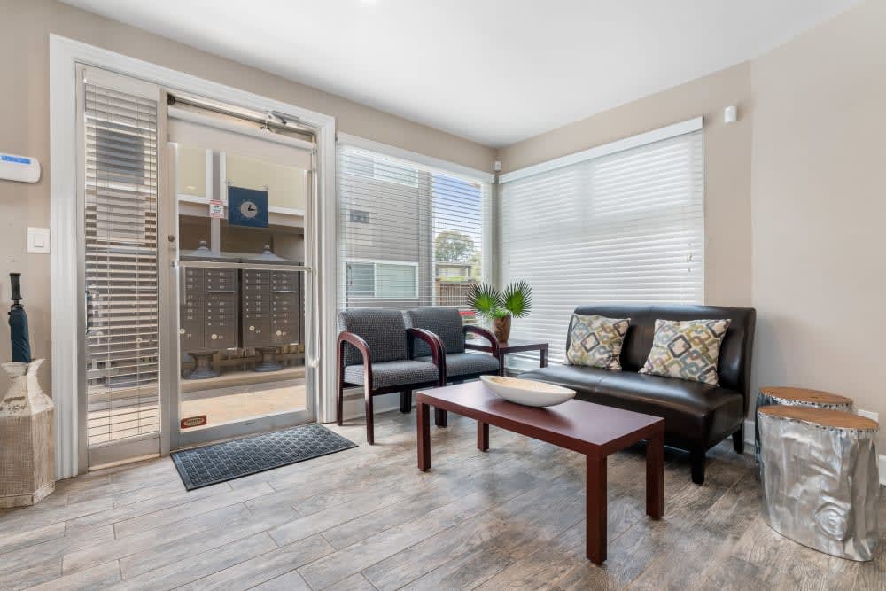 Leasing Office lounge area with chairs and coffee table
