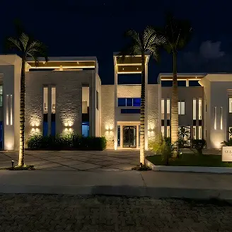 Villa Hurakán luxury villa exterior at night, Akumal Riviera Maya Mexico