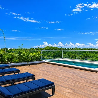 Outdoor tropical dining setup at Villa Hurakán luxury villa Akumal Mexico