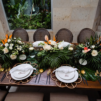 Luxury floral dining table setup at Villa Hurakán Tulum