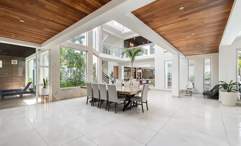 Luxury dining and lounge space for family reunions at Villa Hurakán