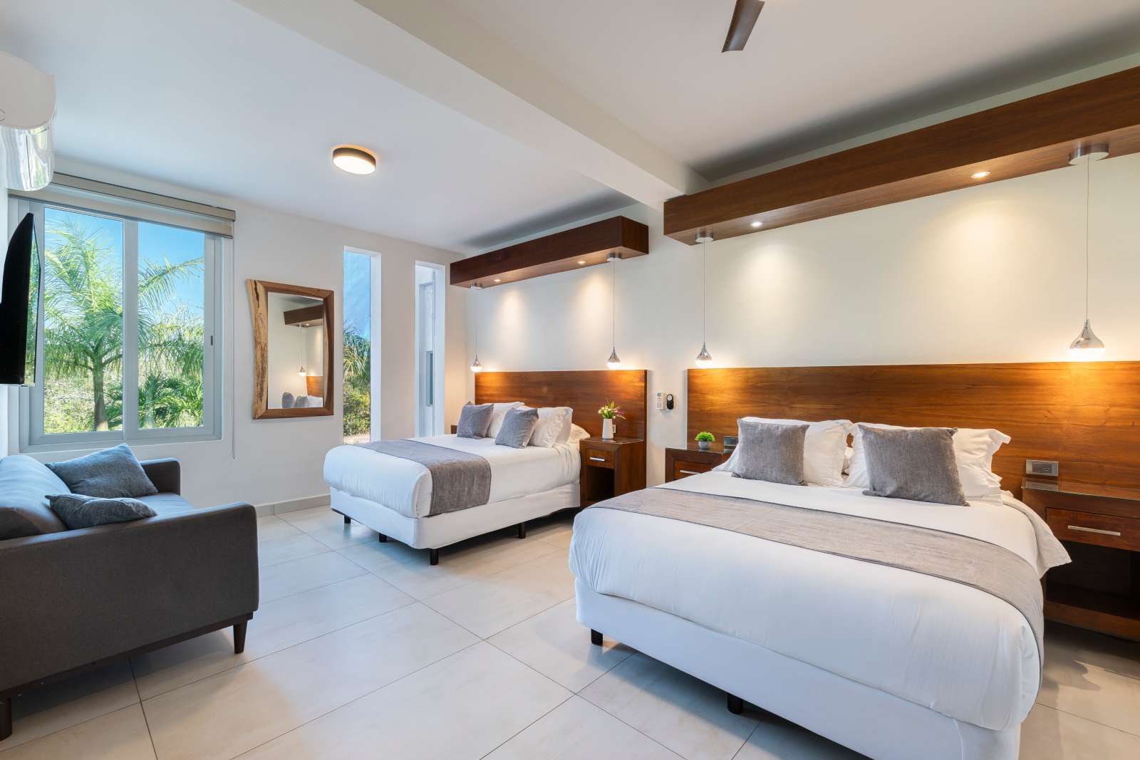 Luxury double queen bedroom suite at Villa Hurakán in Akumal Riviera Maya